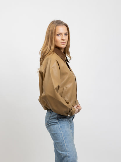 VESTE EN SIMILICUIR À COL CONTRASTÉ